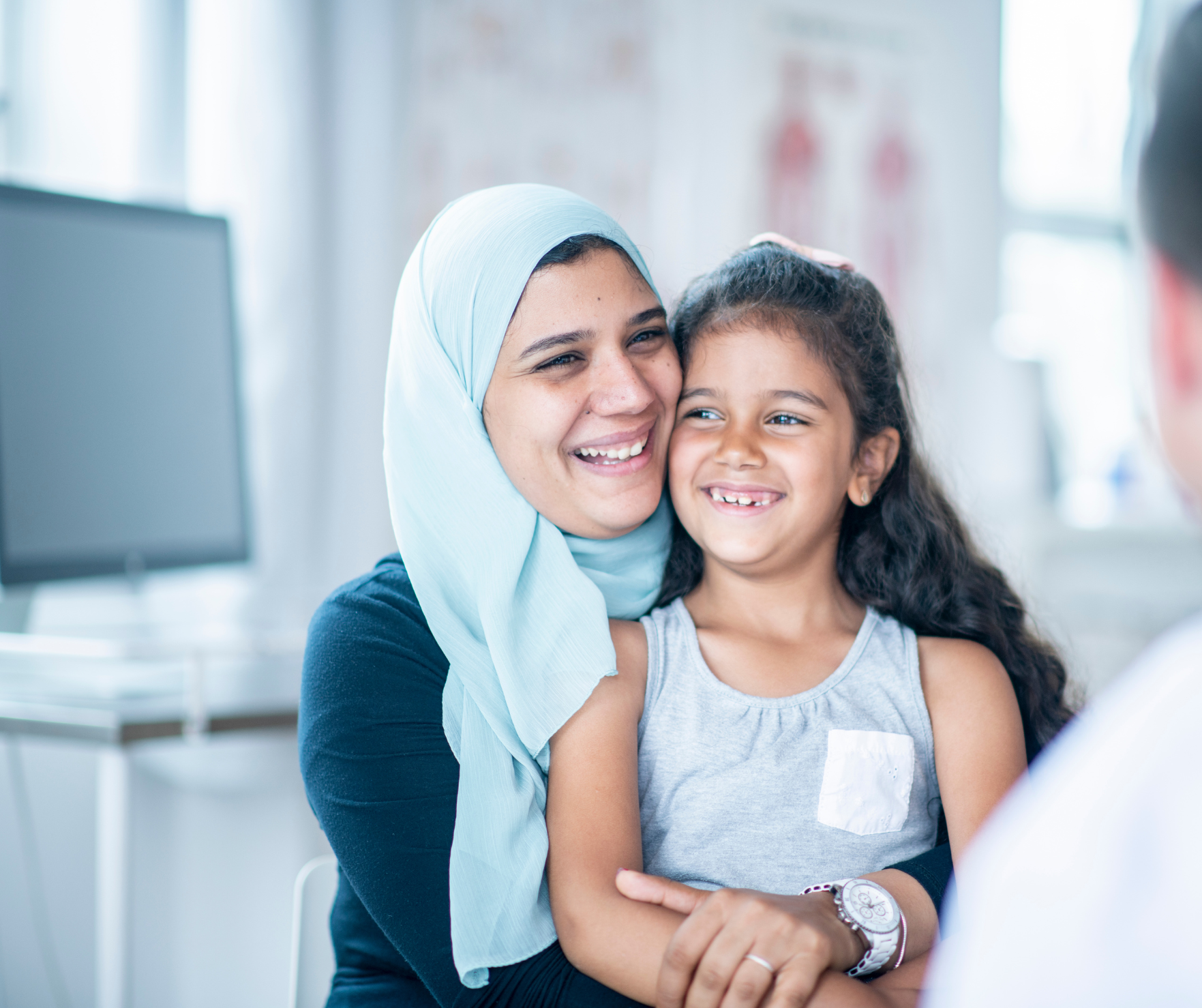 Ukranian Lady with her child in a GP surgery