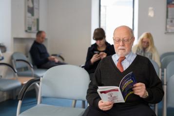 Man in hospital waiting area
