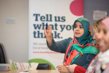 Lady speaking at engagement event