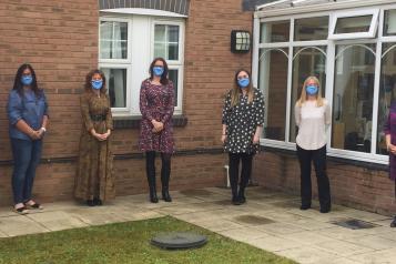 Healthwatch County Durham team stood outside wearing masks